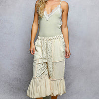 Light sage green ribbed lace-trim cami with v-neck detail and spaghetti straps