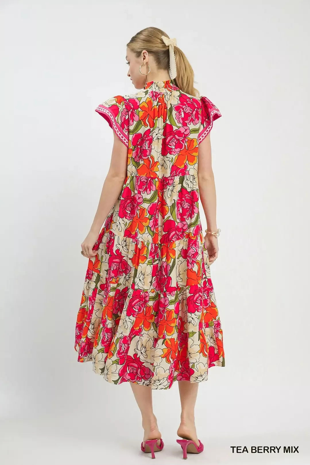 Floral tiered midi dress back view with cap sleeves and gathered tiers