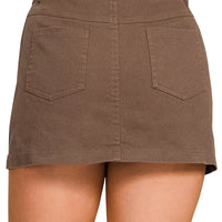 Brown cotton twill mini skirt with belt loops, button fly, two front patch pockets
