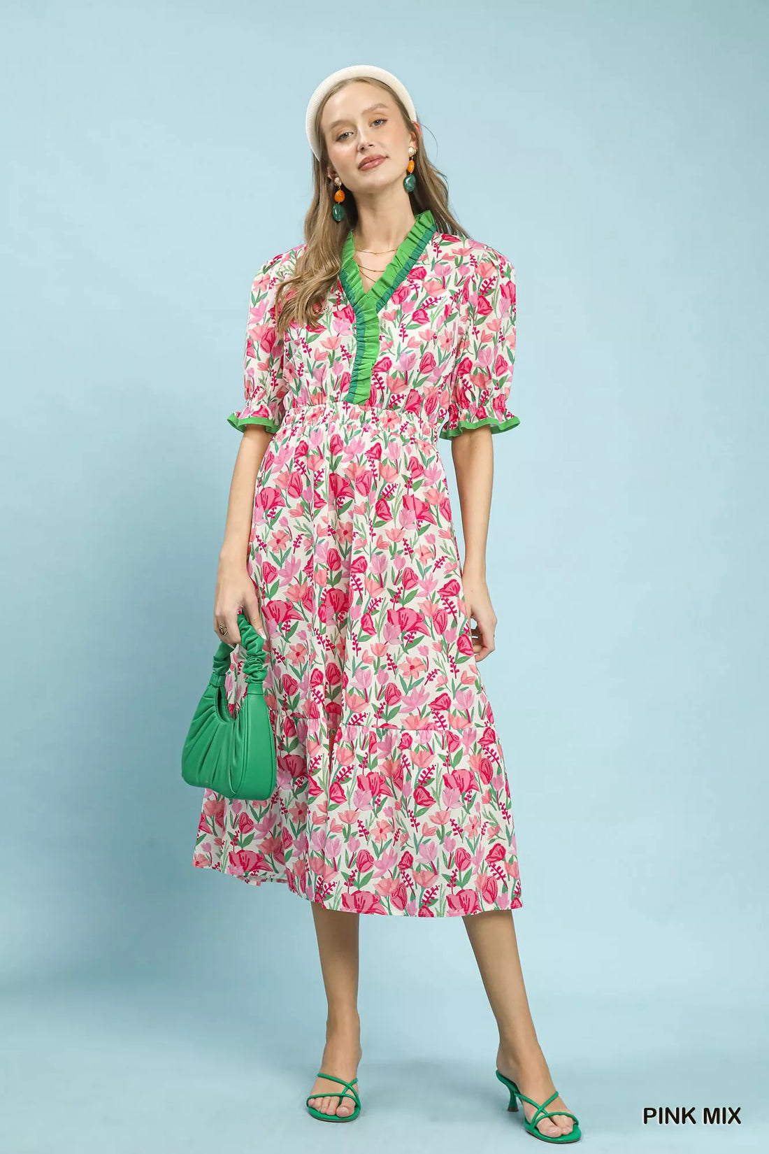 Floral tiered midi dress in pink mix with green trim, puff sleeves, and gathered tiers
