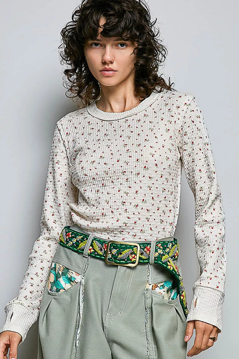 Ivory ribbed knit crew neck long sleeve top with tiny floral print