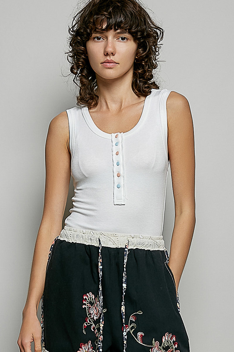 Off-white ribbed tank top with round neck and front button placket