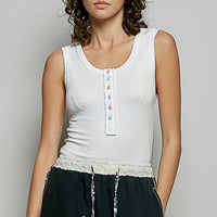 Off-white ribbed tank top with round neck and front button placket