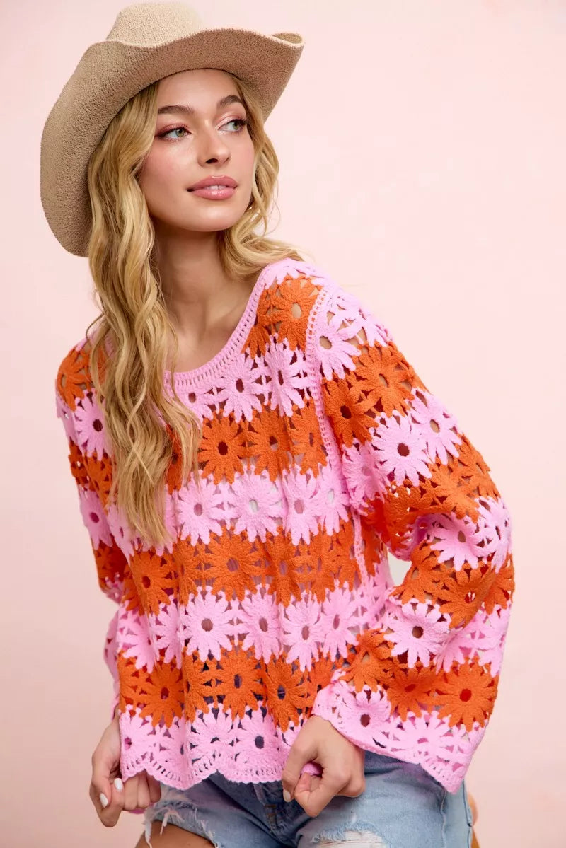 Orange and pink flower crochet top with long sleeves, scoop neck, pullover style.