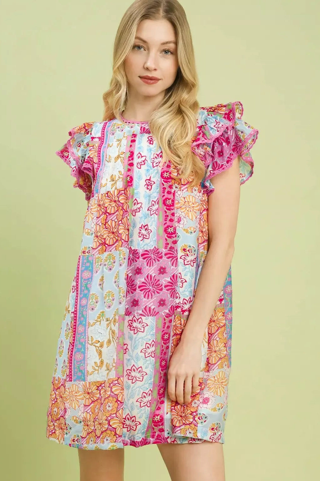 Pink patchwork mini dress with flutter sleeves and ruffled round neckline