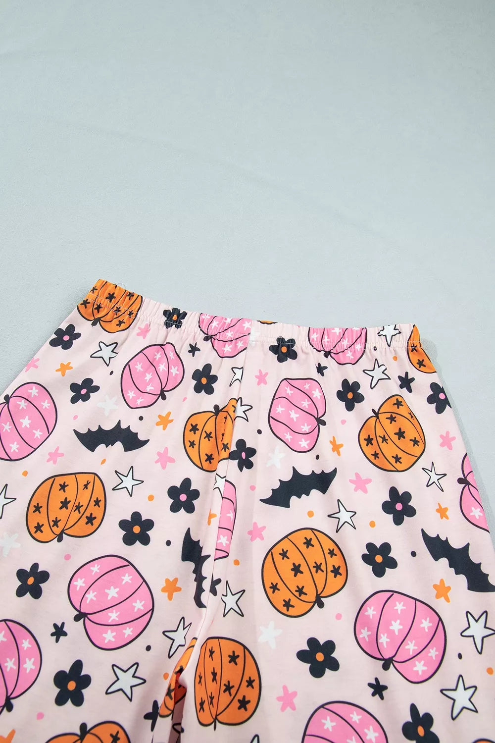 Pink pumpkin print pajama shorts with elastic waistband