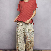 Terra cotta ribbed knit V-neck t-shirt with short sleeves and side slit