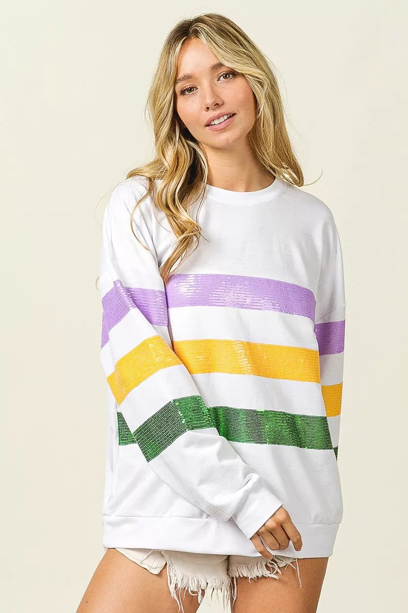 Off-white round-neck sweatshirt with sequined horizontal Mardi Gras stripes, long sleeves