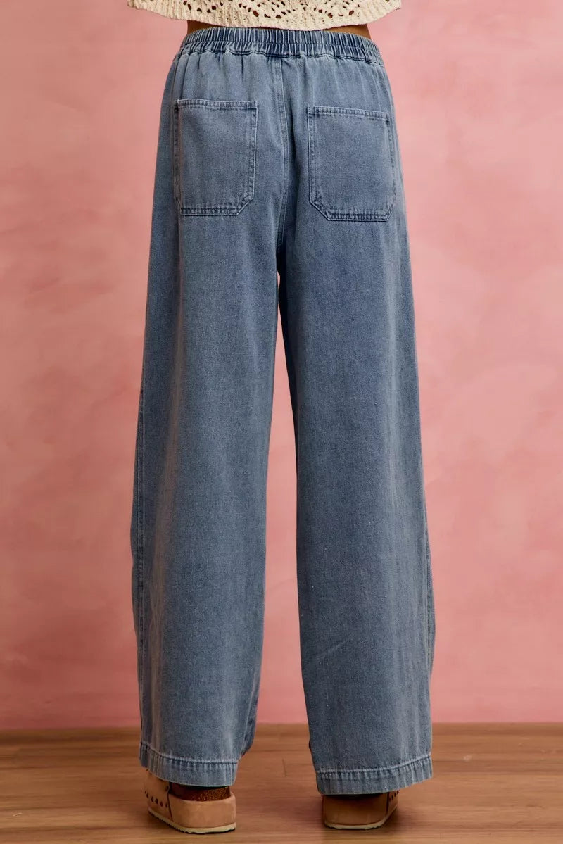 Mid-rise denim wide-leg jeans with ruffled elastic waistband and front pockets
