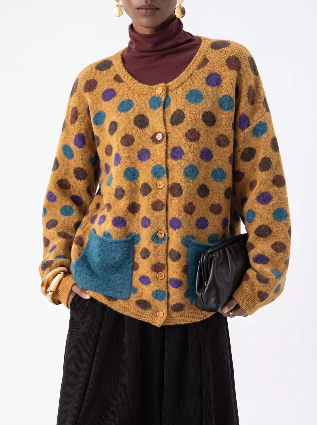 Plus-size mustard polka-dot button cardigan with two blue patch pockets, long sleeves