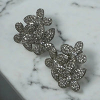 Silver glitter flower cluster stud earrings, front view close-up