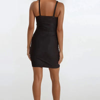 Black bandage dress back with thin straps and fitted silhouette