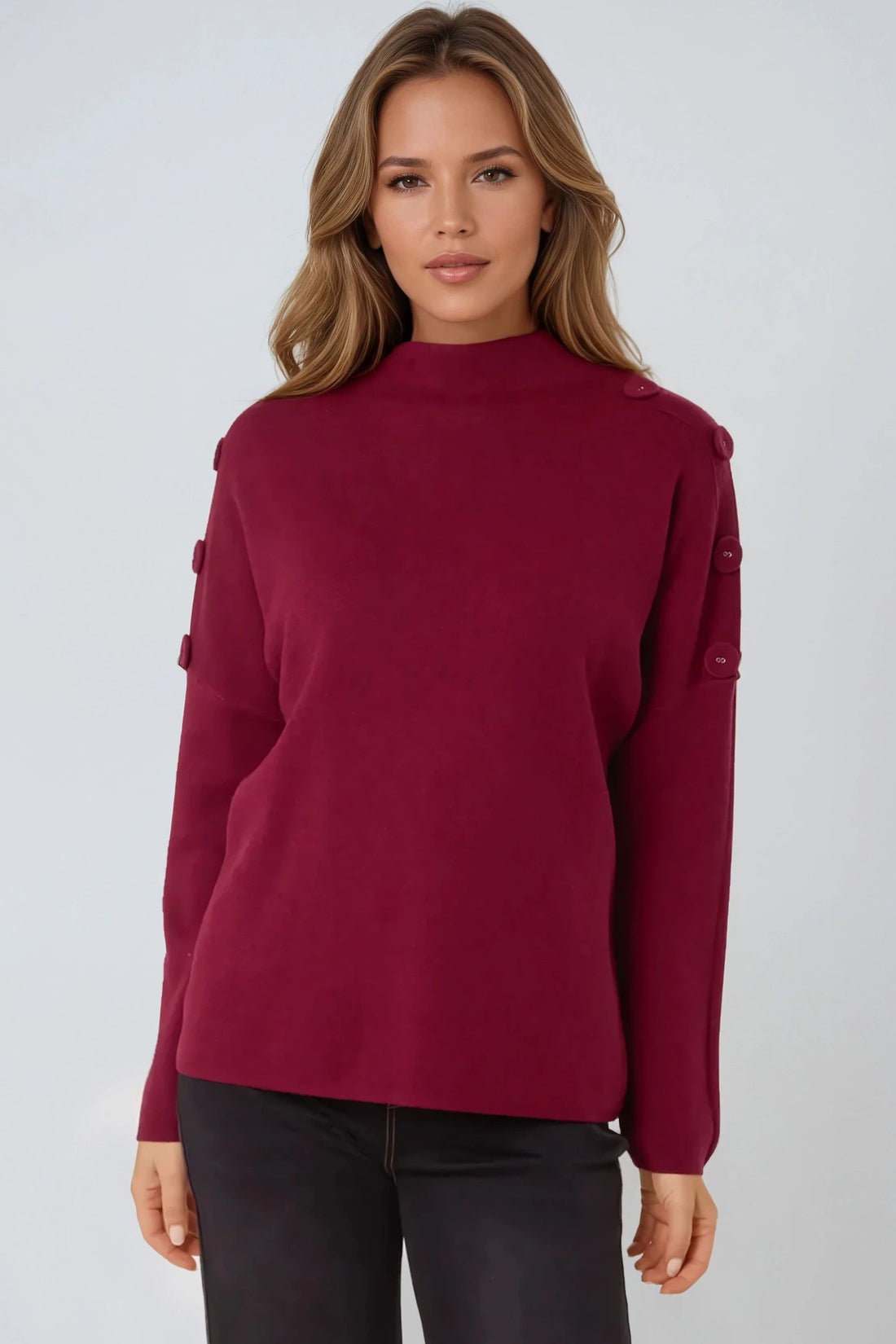 Wine red high-neck jumper with buttoned shoulder details and long sleeves