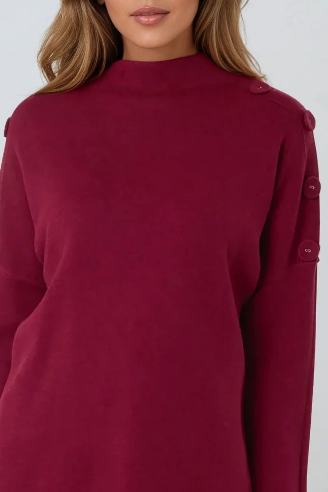 Wine red high-neck jumper back view with button details on sleeves