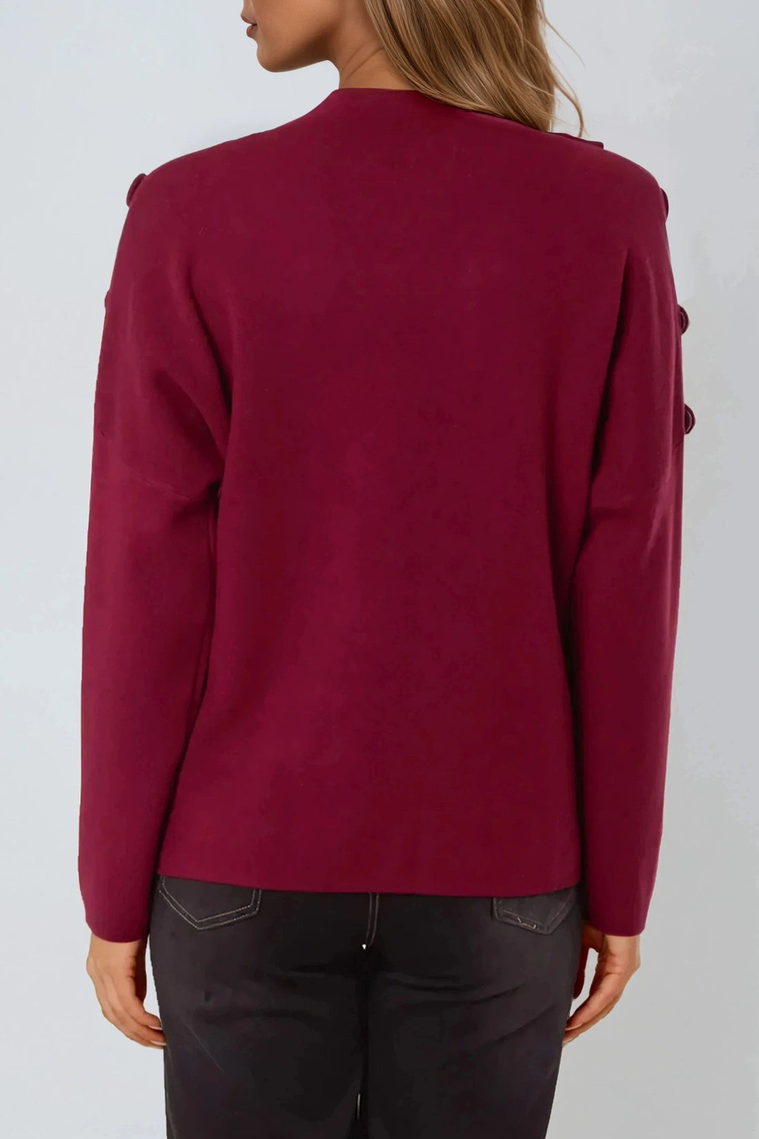 Wine red high-neck jumper back view with shoulder button accents and long sleeves