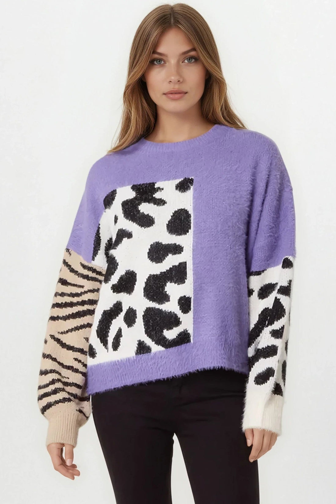 Purple knit jumper with spotted and zebra-striped panels, long sleeves and crew neck