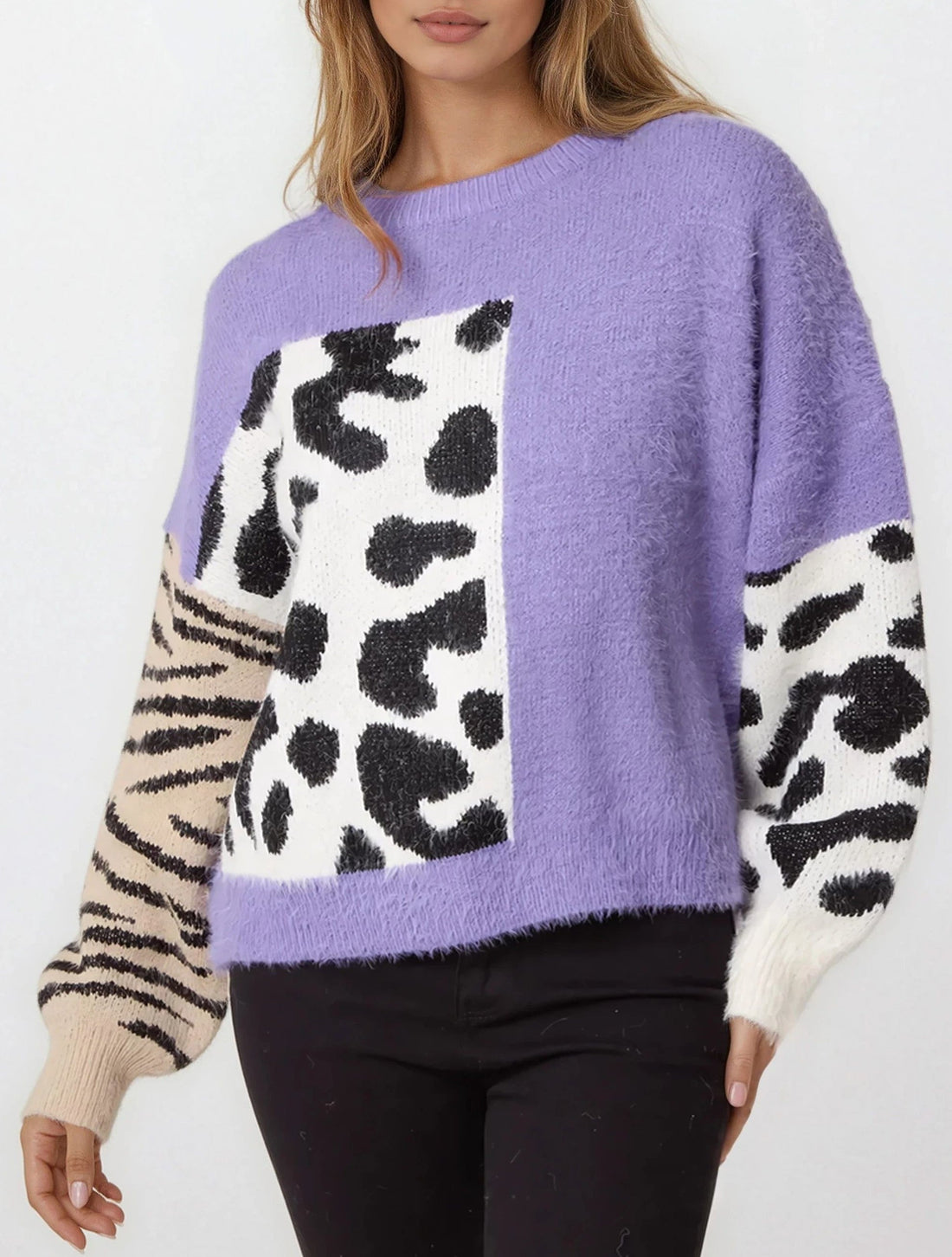 Purple knit jumper with spotted square design and zebra-striped side sleeves