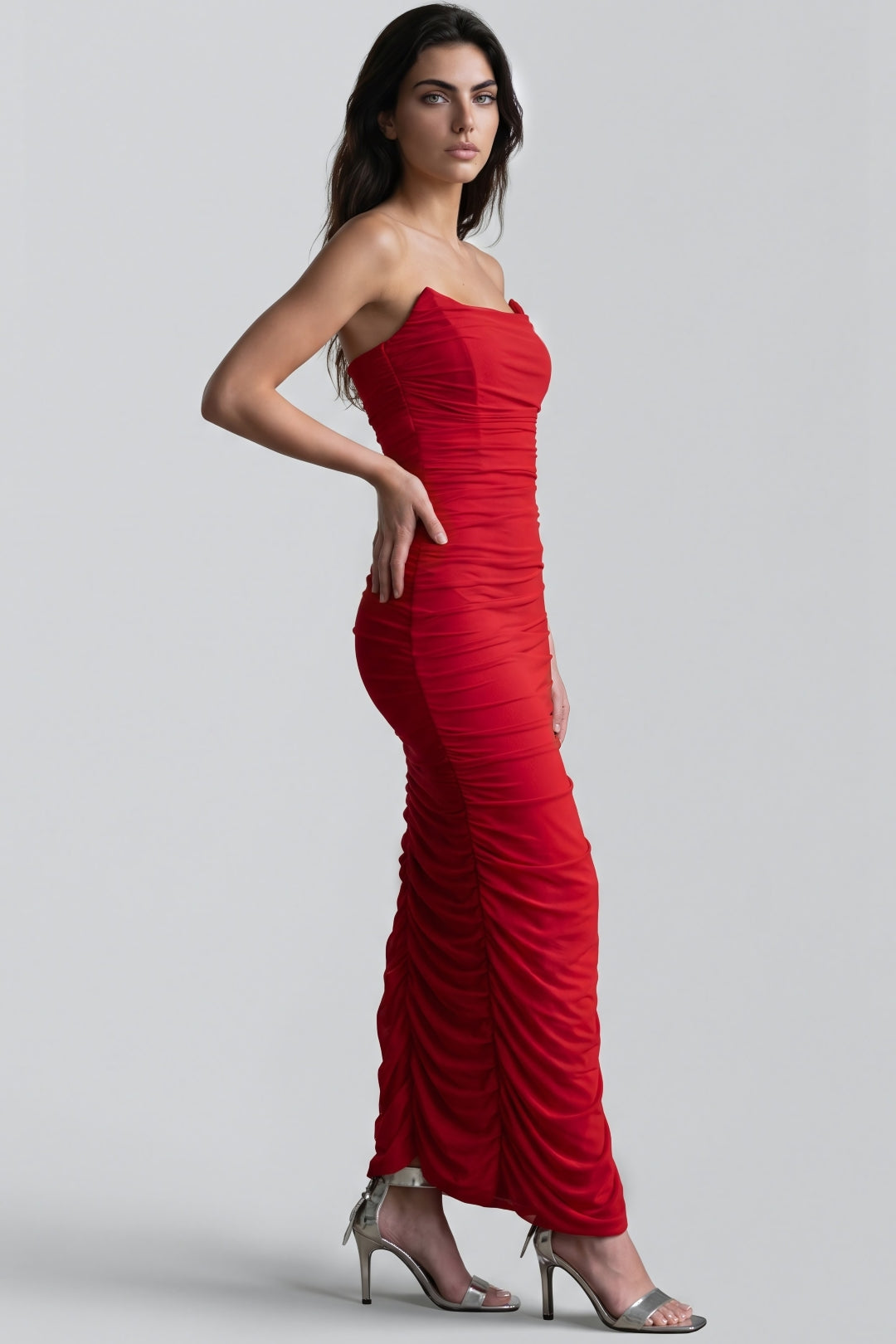 Red strapless ruched maxi dress, fitted waist, visible high side slit