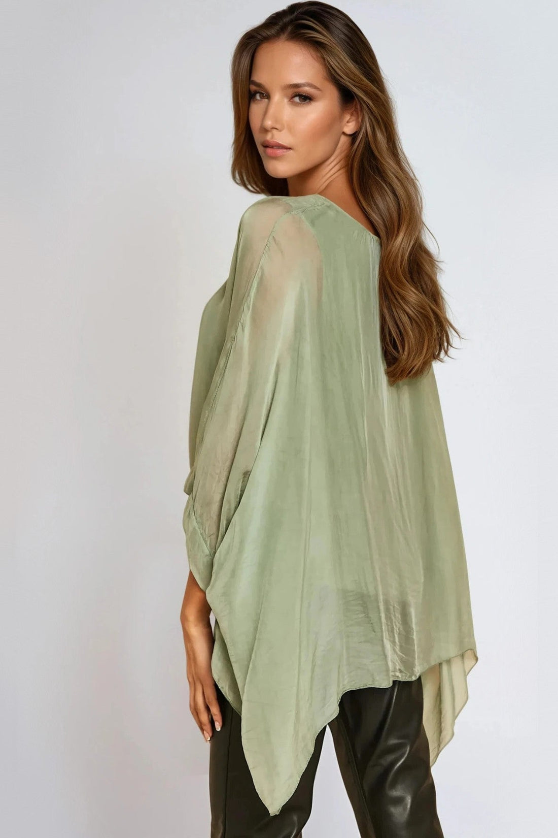 Light green silk batwing-sleeve blouse with round neckline, side view