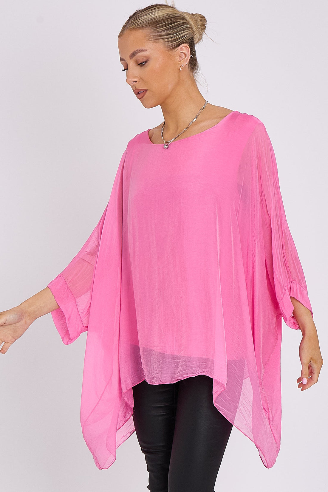 Pink silk batwing-sleeve top, loose drape and curved hem