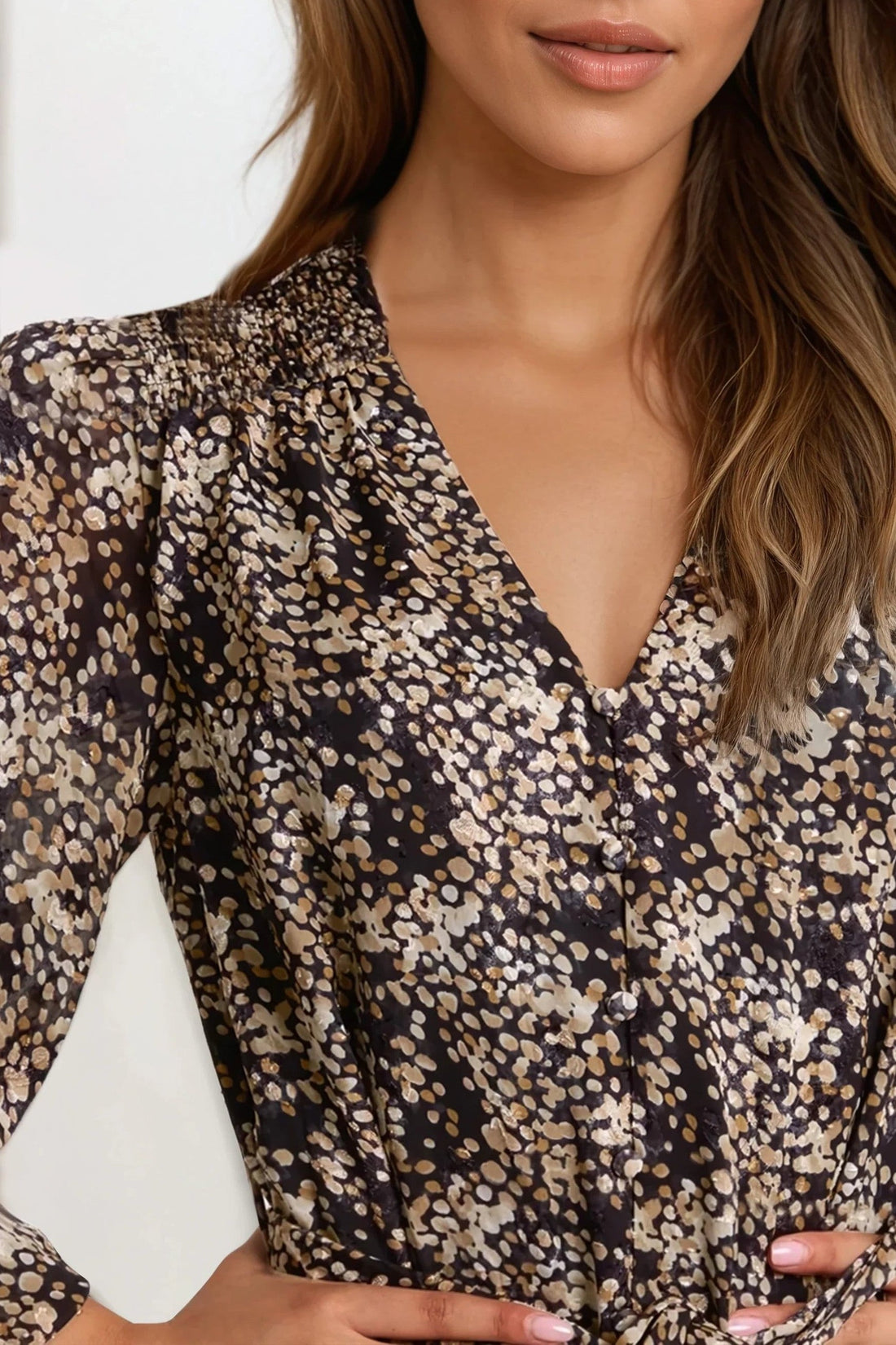 Black spotted mini dress, V-neck button front and long puff sleeves