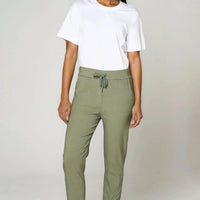 Stretch drawstring trousers, olive-khaki color, side pockets and cuffed hems