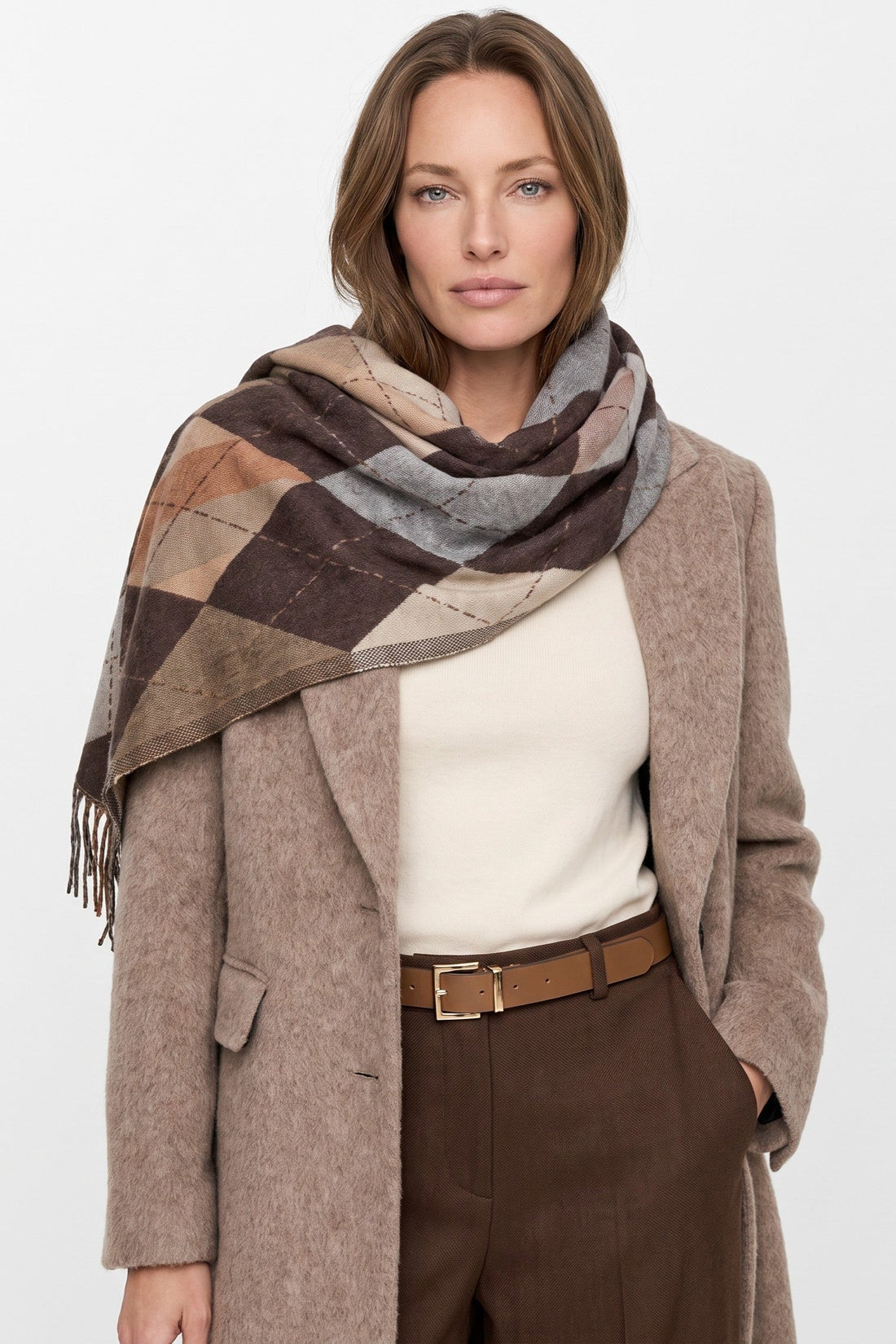 Brown argyle scarf with diamond check pattern and long fringed ends, draped around neck