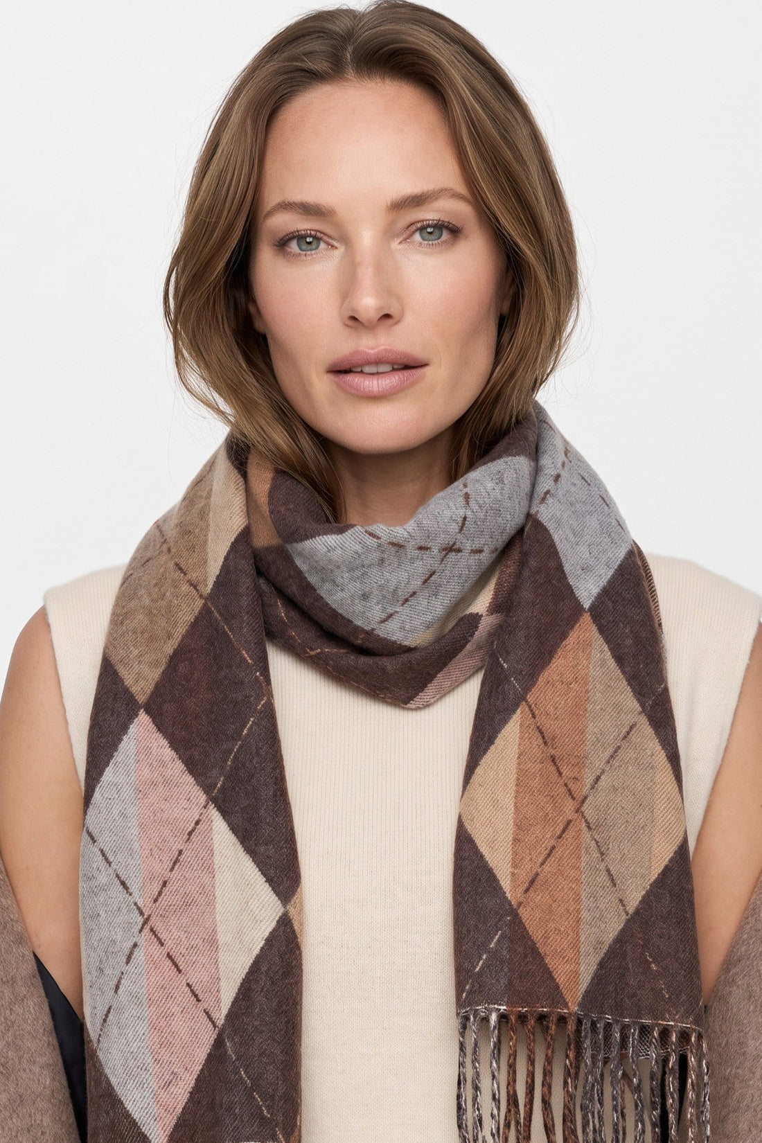 Brown argyle scarf with diamond checks and fringe trim, worn as neck wrap
