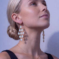 Gold-tone opal teardrop chandelier earrings, dangling multi-drop design