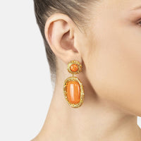 Gold drop earrings with round orange cabochon and dangling oval orange stone