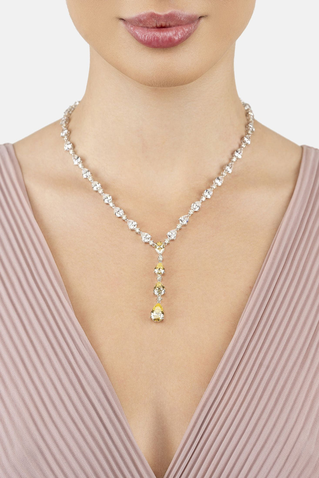 Silver necklace with clear crystal links and yellow topaz drop center
