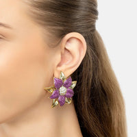 Gold-tone purple daisy stud earrings with white crystal center
