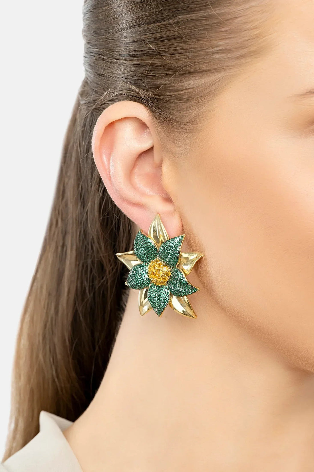 Emerald green flower stud earrings with gold leaves and yellow center