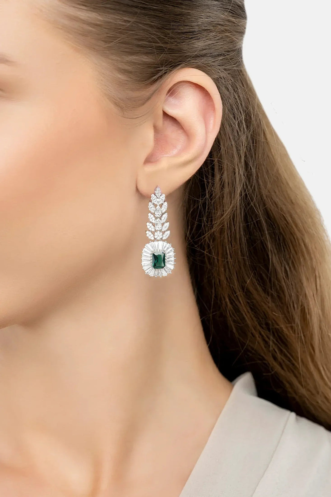 Countess gemstone drop earring with emerald center and silver crystal leaf design