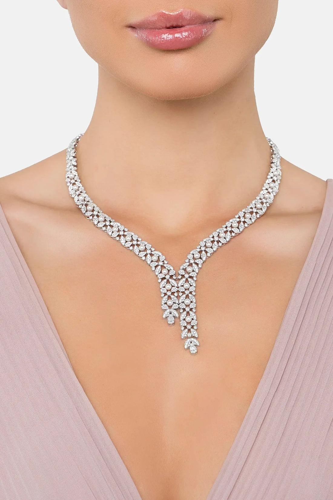Rhinestone statement necklace with teardrop centerpiece and short fringe drops