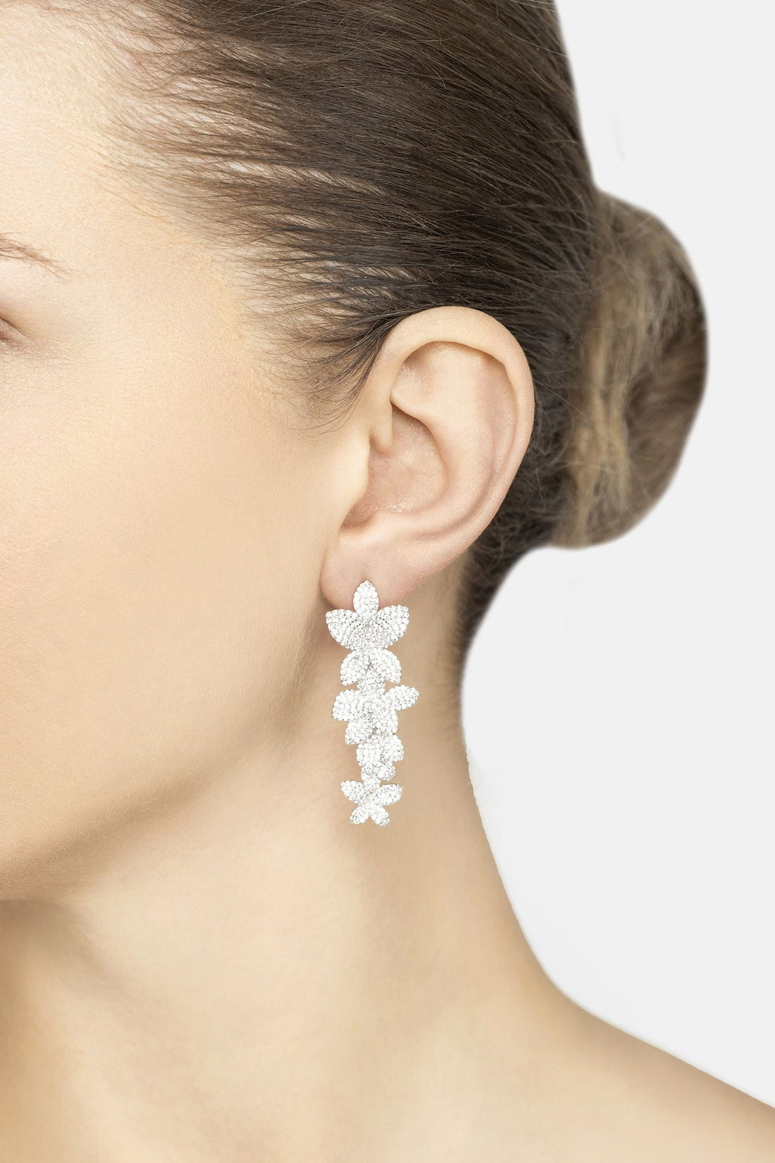 Cherry blossom drop earrings close-up, white-silver glitter floral drops