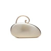Gold-tone asymmetric clutch bag with curved top handle and spiral accent