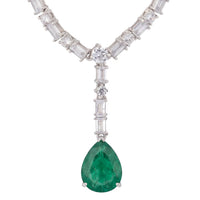 Sterling silver necklace with emerald teardrop pendant and faceted crystal link stations