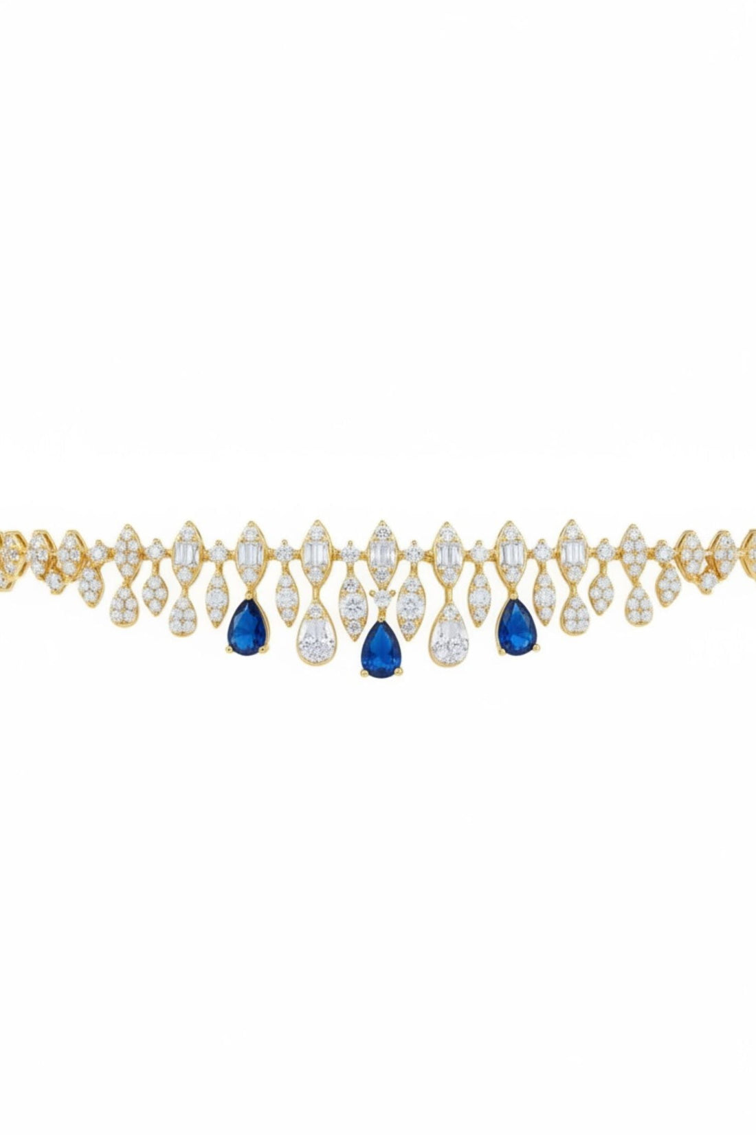 Gold tennis bracelet with pear-shaped sapphire and clear stone drops