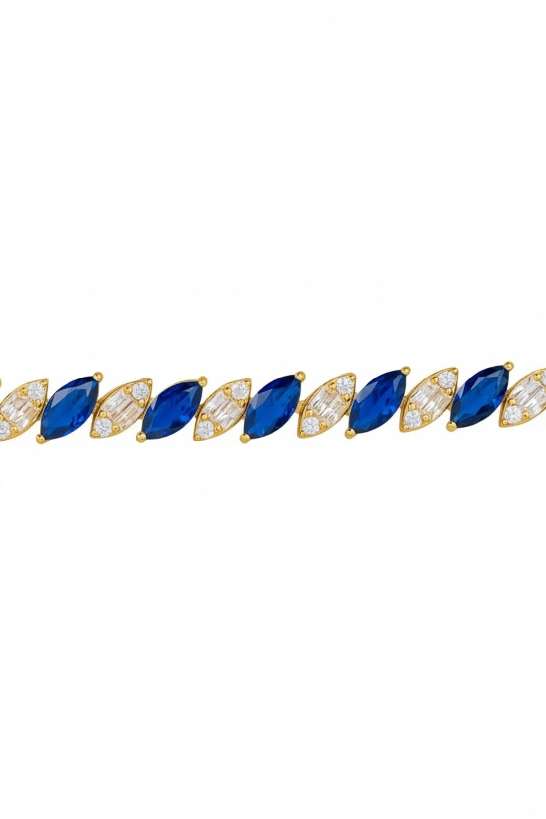 Row of gold tennis bracelet with blue oval gemstones and clear stones