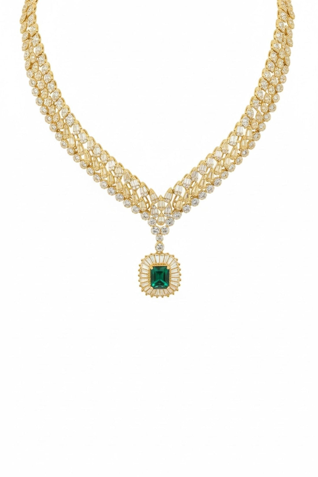 Gold-tone statement necklace with emerald pendant and rhinestone chain