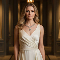 Rhinestone necklace with green emerald center pendant on model