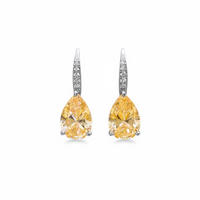 Teardrop earrings with yellow topaz stones and pavé-set silver-tone drop settings