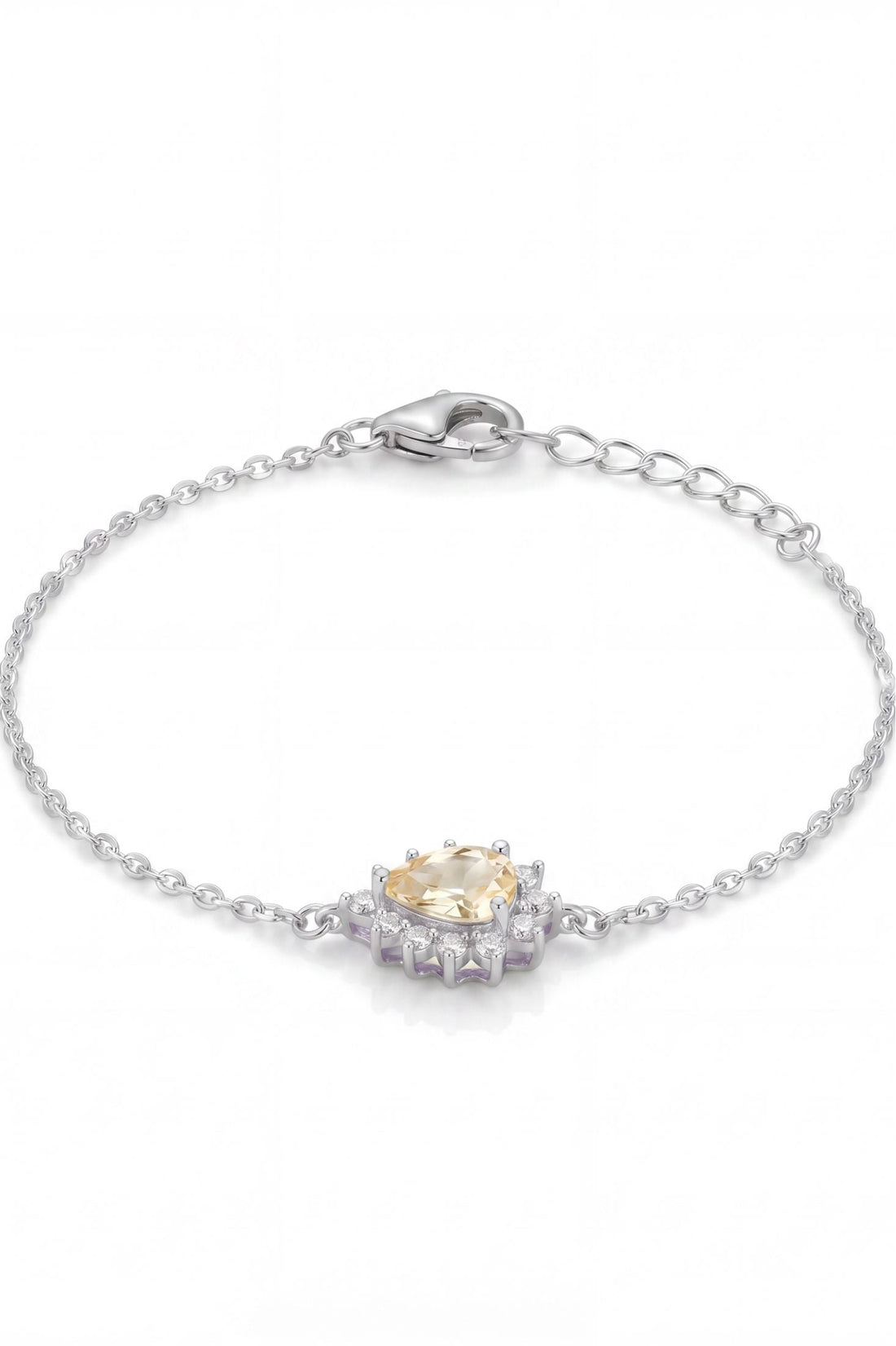 Silver bracelet with yellow topaz and clear stones