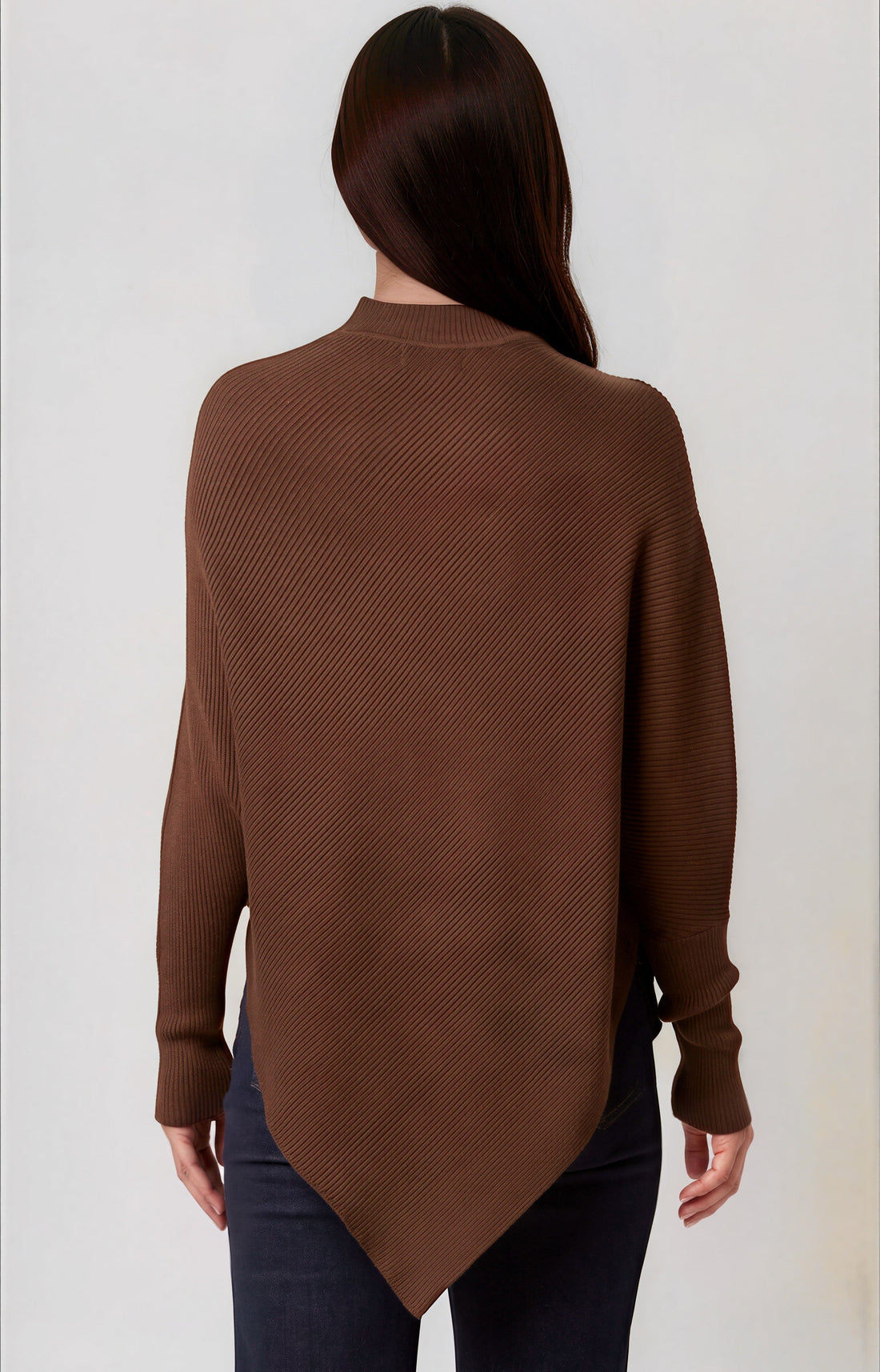 Back view of brown high-neck jumper with batwing sleeves and asymmetric hem