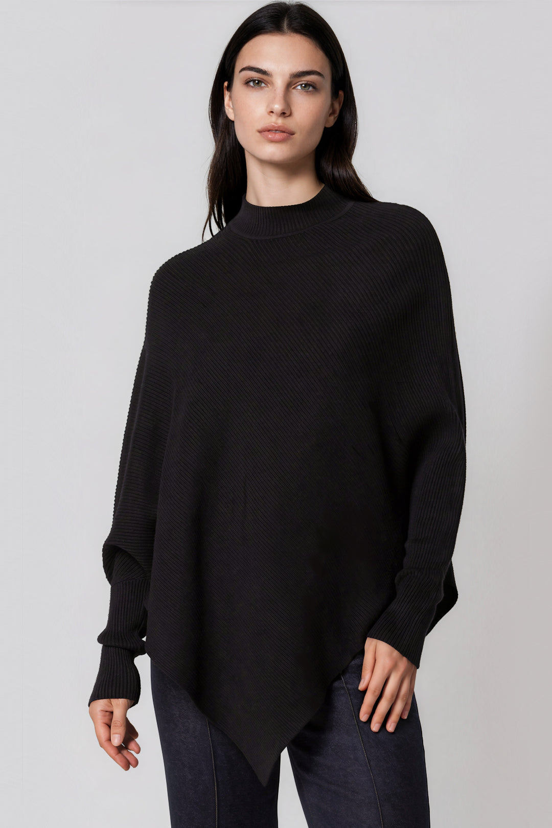 Black high-neck jumper with batwing sleeves and asymmetric side hem