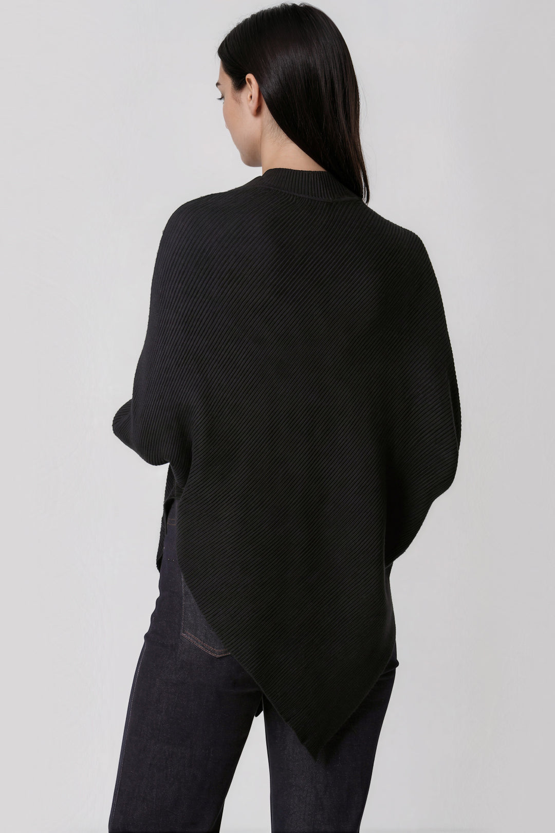 Black high-neck batwing knit jumper, angled asymmetric back hem