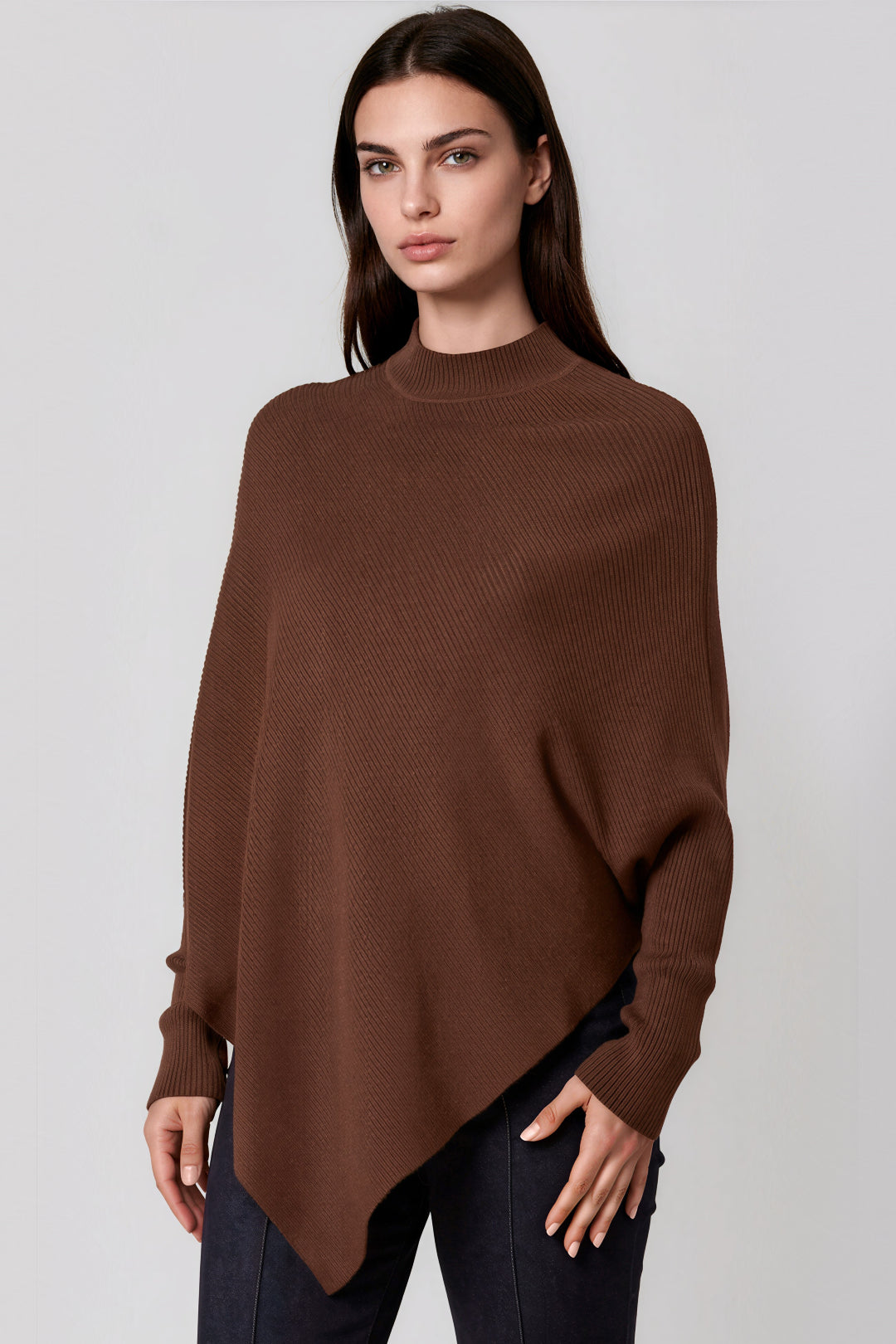 Brown high-neck jumper with batwing sleeves and asymmetric draped hem
