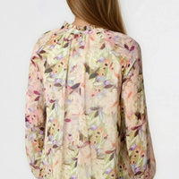 Floral blouse back view with puff sleeves, cream with green and pink leaf print