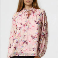 Pink floral tie-neck blouse with sheer blouson sleeves